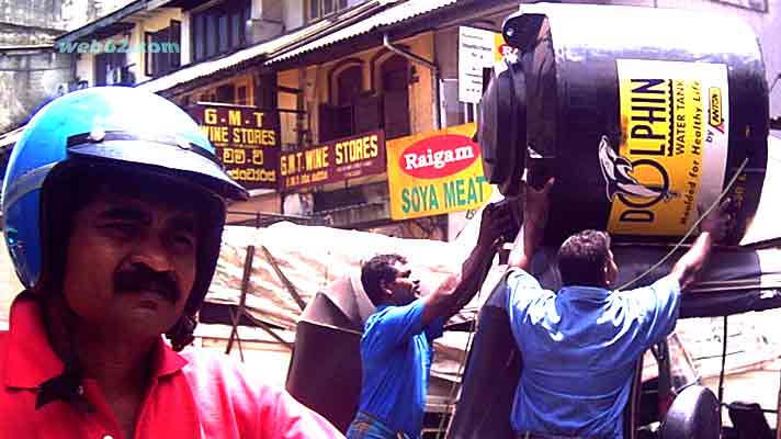 Photo from Men at workin Kandy, Sri Lanka men at work in Kandy, Sri Lanka